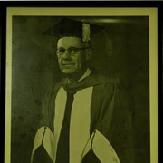 Cover image of [John Lee Laurie in university robes]